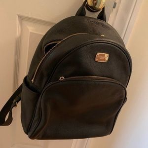 Michael Kors black gold leather backpack, like new